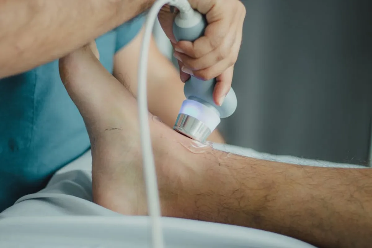 Patient receiving one of several shockwave therapy sessions