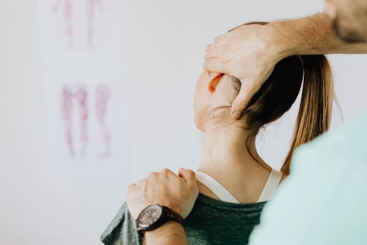 Person experiencing shoulder pain when reaching, a symptom of calcific tendinitis